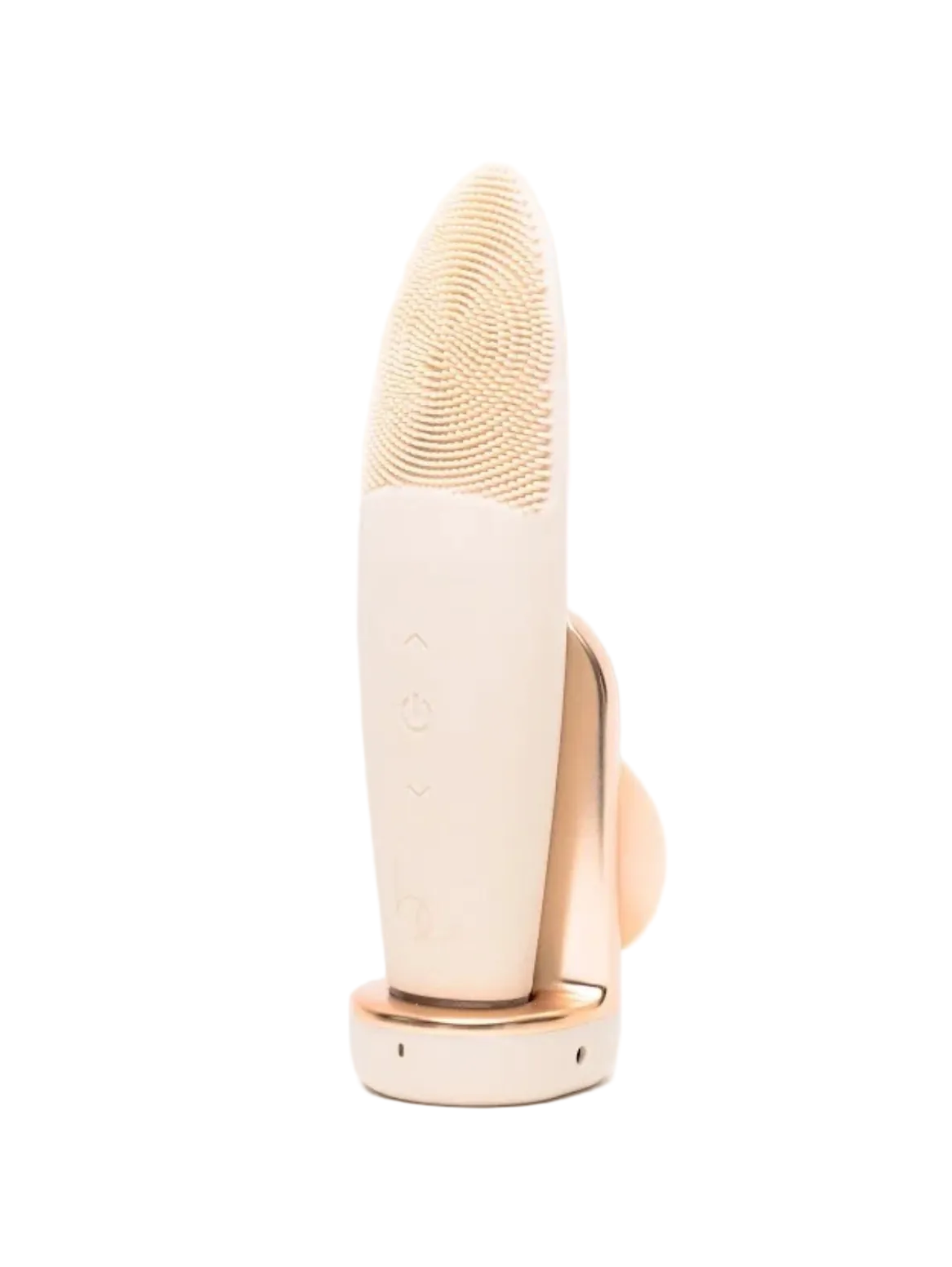 A silicone facial cleansing brush with a white handle and a curved brush head, displayed upright with a magnetic induction charging base partially visible.