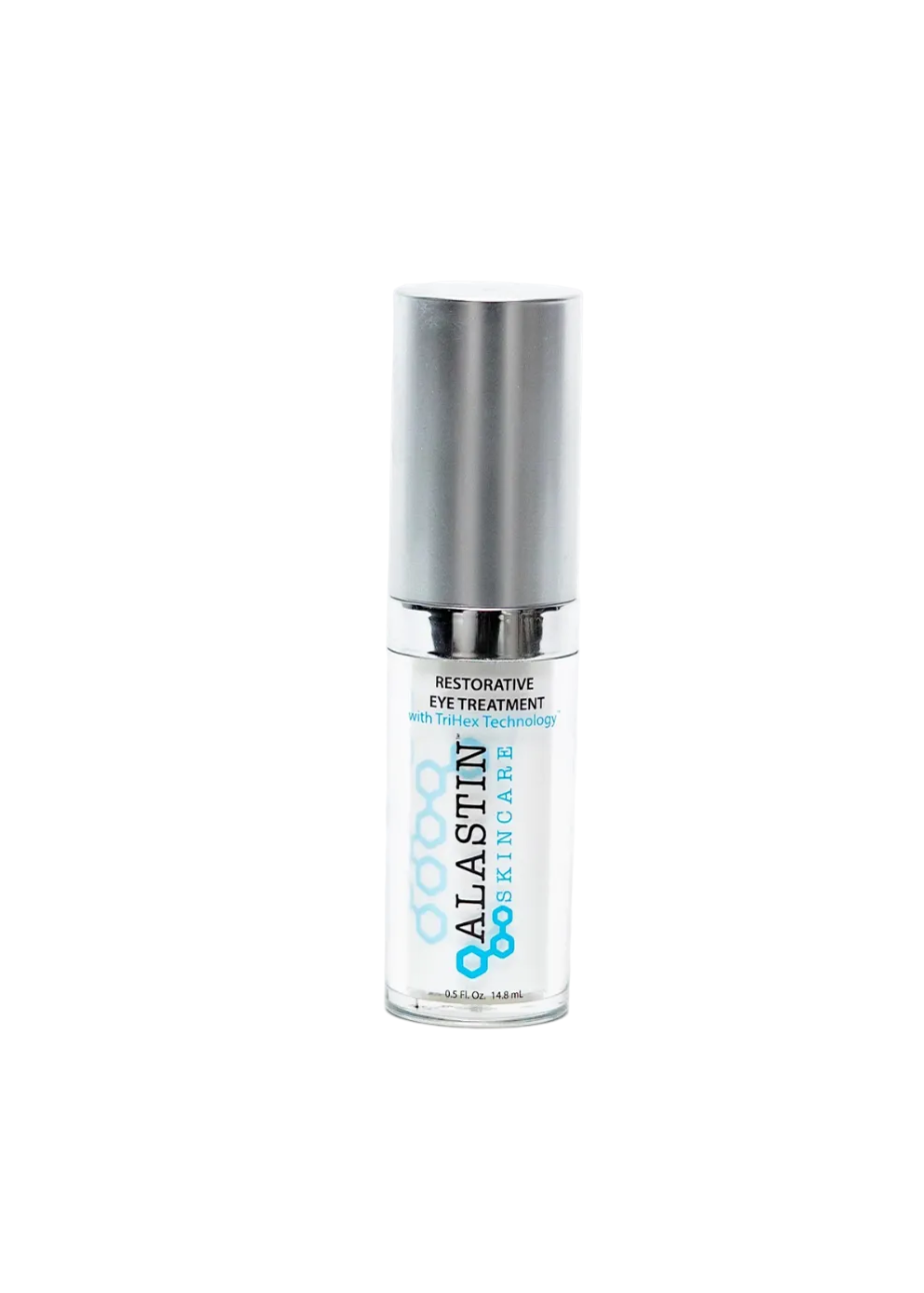 A bottle of Alastin Restorative Eye Treatment against a white background.