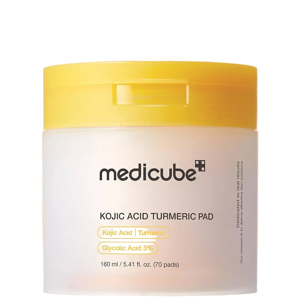 Medicube Kojic Acid Turmeric Pad packaging with yellow lid on a beige background